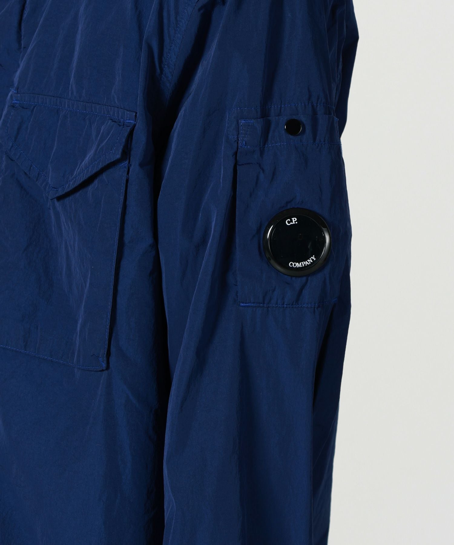 C.P. Company(シーピーカンパニー)】 CHROME-R ZIPPED LENS OS