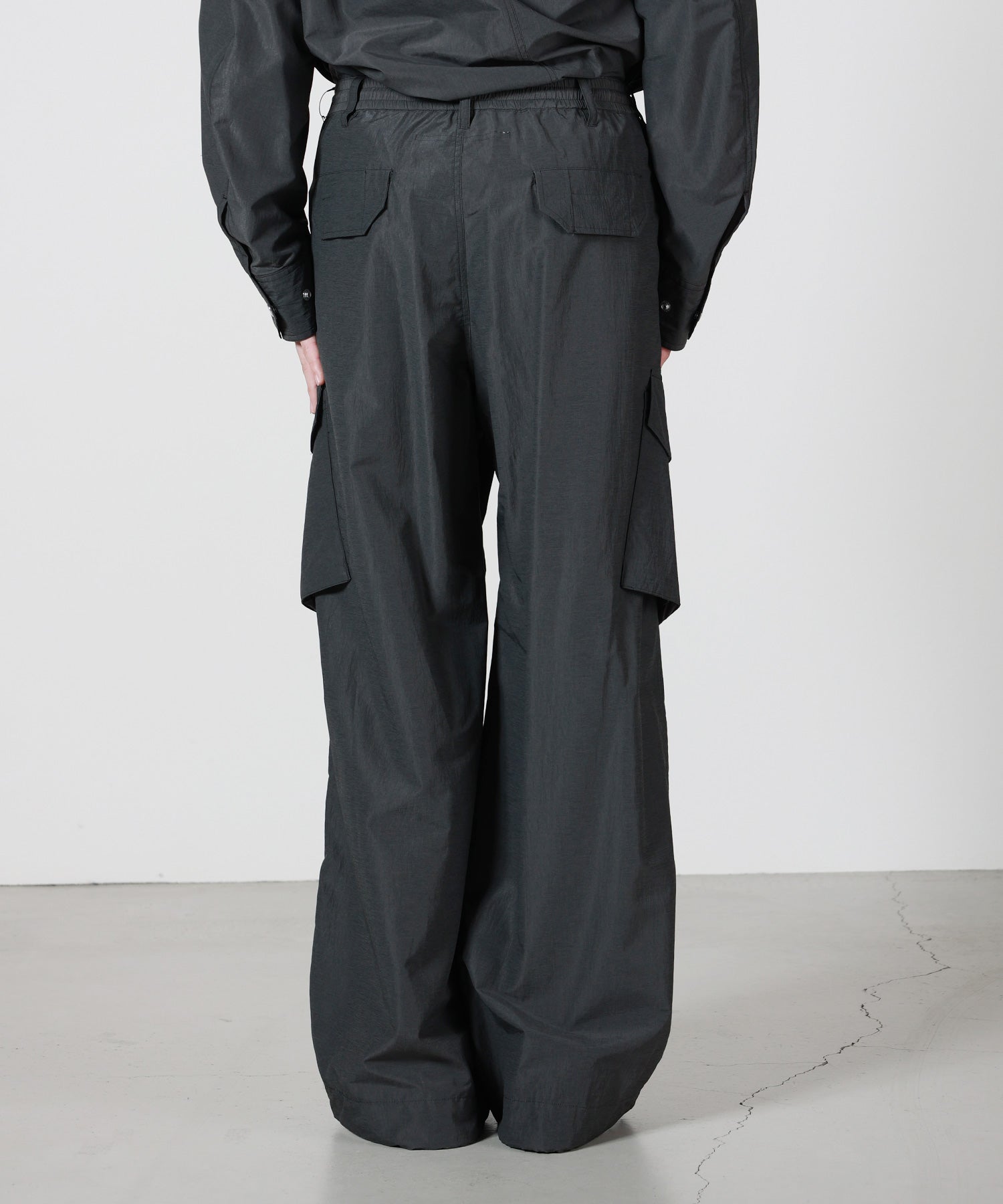 Tamme タム　パンツ　ブラック×グレー　モード 24SS Tamme(タム)】 NYLON PCS COMBAT SLACKS｜PARIGOT ONLINE（パリゴ